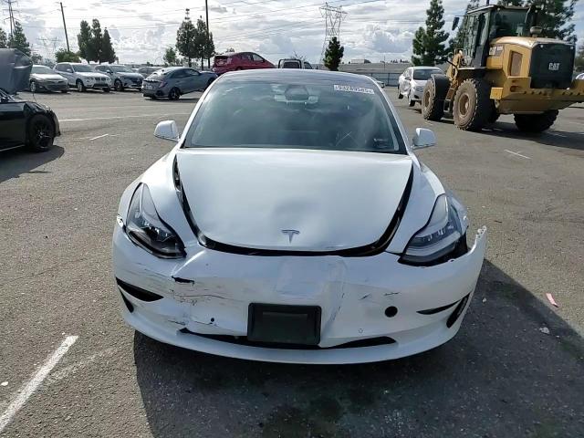 2020 Tesla Model 3 VIN: 5YJ3E1EB7LF600499 Lot: 93289585