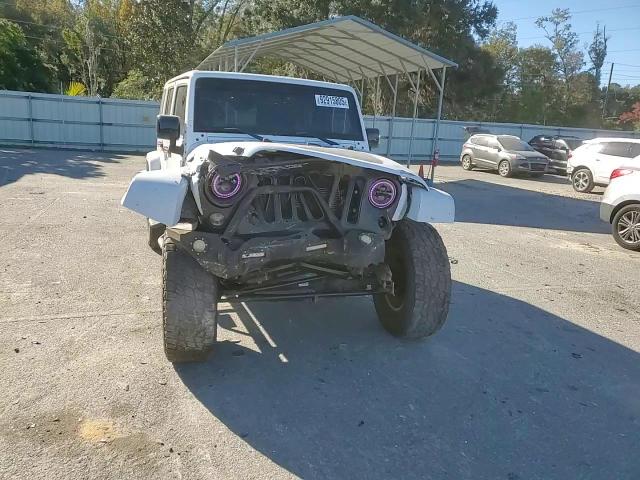 2014 Jeep Wrangler Unlimited Sahara VIN: 1C4BJWEG8EL285986 Lot: 92915805