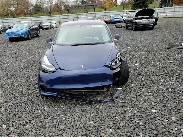 2018 Tesla Model 3 VIN: 5YJ3E1EAXJF110210 Lot: 82755095