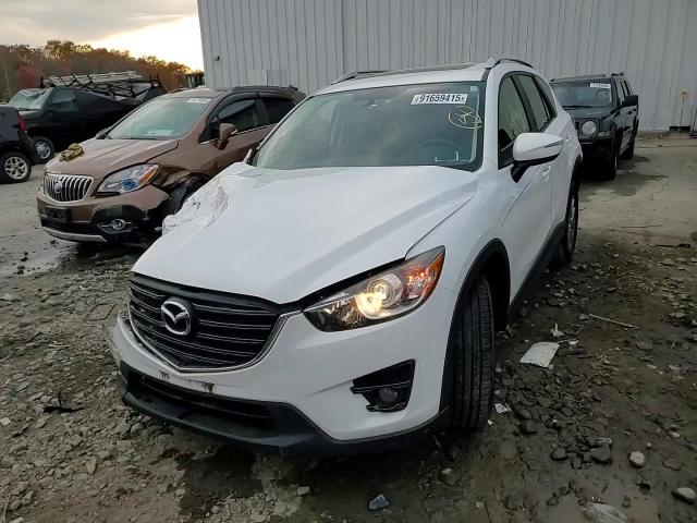 2016 Mazda Cx-5 Touring VIN: JM3KE4CY3G0676060 Lot: 91659415