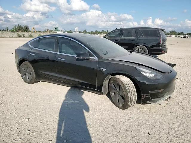 2019 Tesla Model 3 VIN: 5YJ3E1EA6KF409338 Lot: 93230585