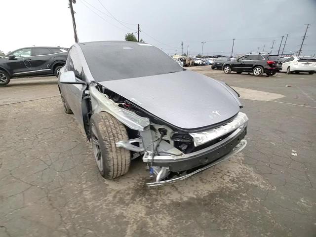2025 Tesla Model Y VIN: 7SAYGDED5SF318706 Lot: 93354675