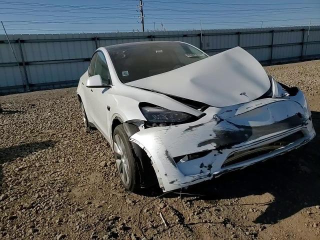 2023 Tesla Model Y VIN: 7SAYGDEE8PF809223 Lot: 85403895