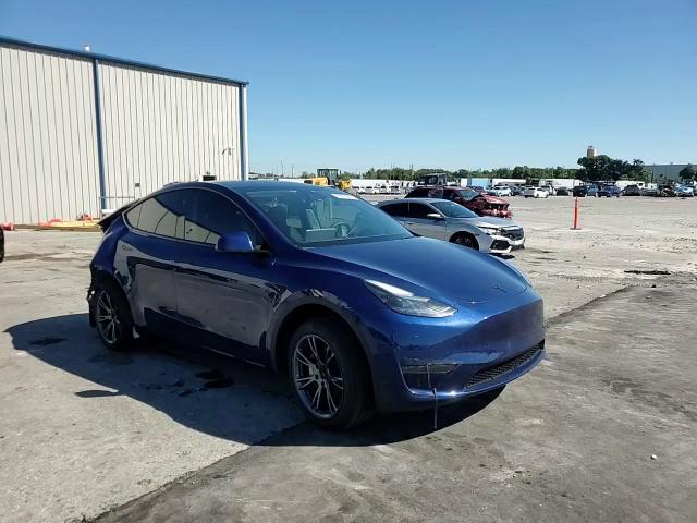 2024 Tesla Model Y VIN: 7SAYGDED4RF169134 Lot: 90823065