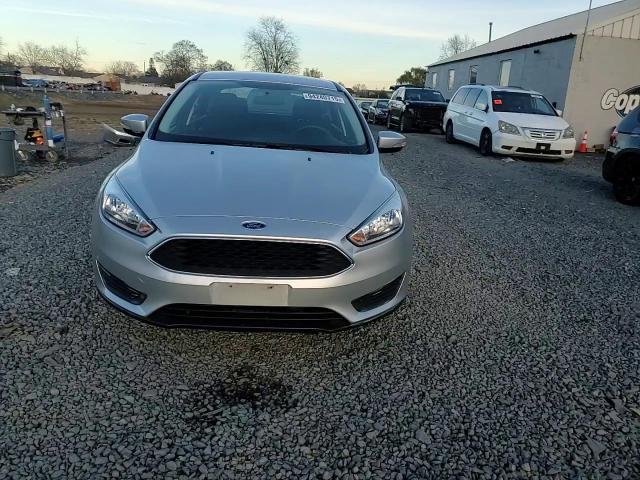 2017 Ford Focus Se VIN: 1FADP3F20HL335816 Lot: 94240715