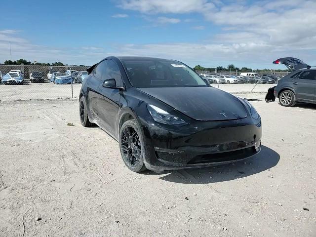 2023 Tesla Model Y VIN: 7SAYGDEE3PF709823 Lot: 92234085