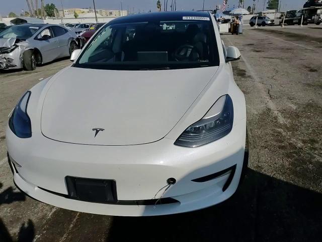 2023 Tesla Model 3 VIN: 5YJ3E1EA5PF578175 Lot: 91310005