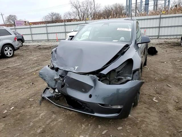 2023 Tesla Model Y VIN: 7SAYGAEE9PF750911 Lot: 94286175
