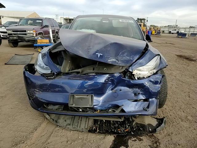 2021 Tesla Model Y VIN: 5YJYGAEE3MF180042 Lot: 92395875