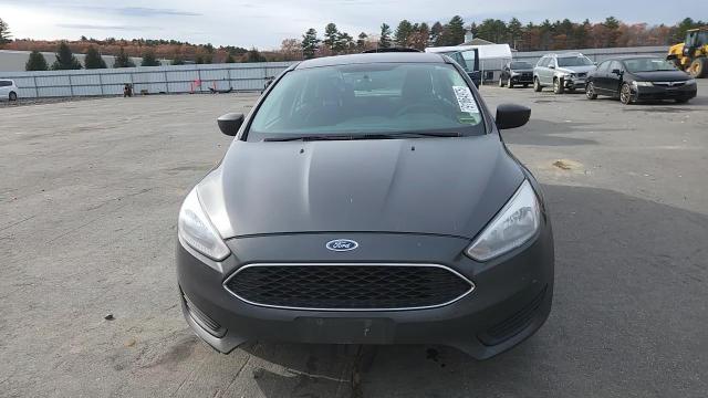 2015 Ford Focus S VIN: 1FADP3E25FL386534 Lot: 91864975