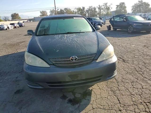 2004 Toyota Camry Le VIN: 4T1BE32KX4U373843 Lot: 94036595