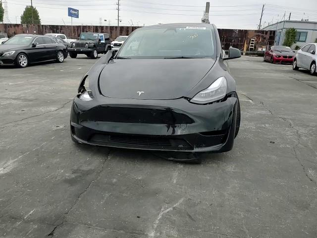 2023 Tesla Model Y VIN: 7SAYGDEF4PF838436 Lot: 91468385