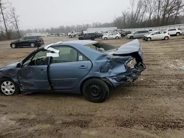 2004 Toyota Camry Le VIN: 4T1BE32K04U927990 Lot: 93869945