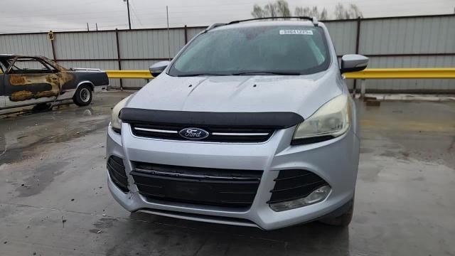 2016 Ford Escape Titanium VIN: 1FMCU0J97GUB97116 Lot: 94041225
