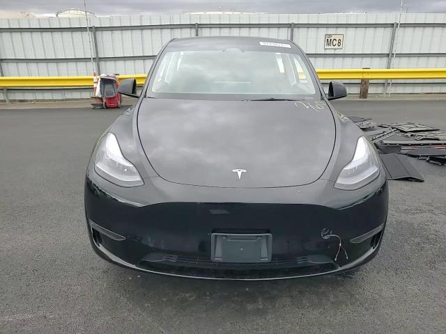 2025 Tesla Model Y VIN: 7SAYGDED4SF227927 Lot: 91438315