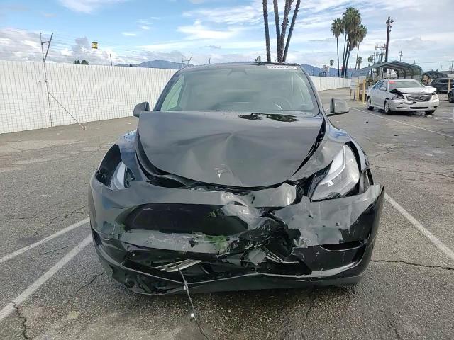 2024 Tesla Model Y VIN: 7SAYGDED2RF162618 Lot: 93695165
