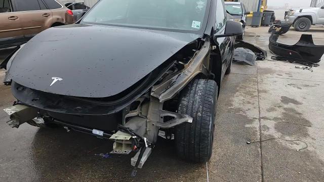 2025 Tesla Model Y VIN: 7SAYGDEE9SF305918 Lot: 84817505