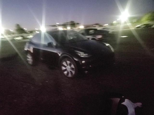 2022 Tesla Model Y VIN: 7SAYGDEEXNF411895 Lot: 92825395