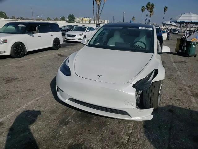 2023 Tesla Model Y VIN: 7SAYGDEE3PF804074 Lot: 90860945
