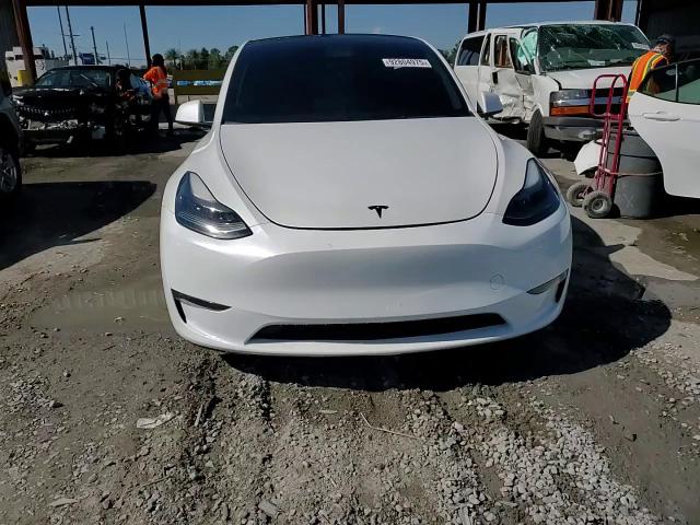 2023 Tesla Model Y VIN: 7SAYGDEF2PF920830 Lot: 92804975