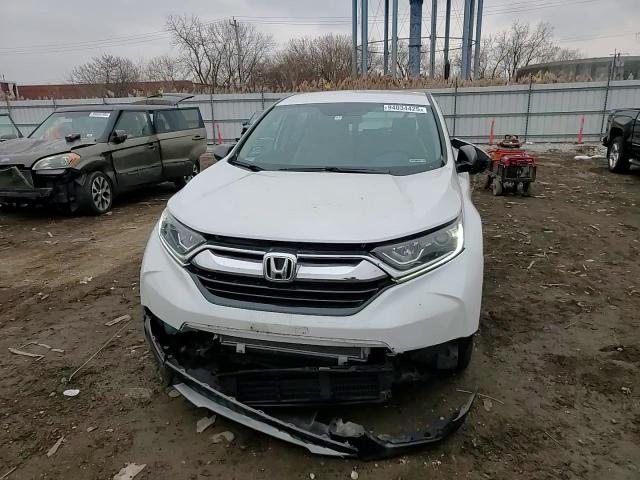 2019 Honda Cr-V Lx VIN: 2HKRW6H38KH208429 Lot: 94034425