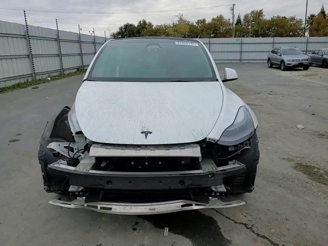 2023 Tesla Model Y VIN: 7SAYGDEF3PF815696 Lot: 91650135