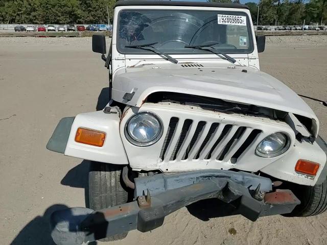 2002 Jeep Wrangler / Tj Se VIN: 1J4FA29P62P740112 Lot: 92869865