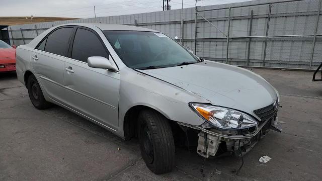 2003 Toyota Camry Le VIN: JTDBE32K130150200 Lot: 93899645