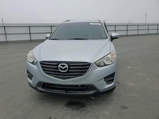2016 Mazda Cx-5 Sport VIN: JM3KE2BY0G0775389 Lot: 94300235