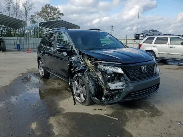 2019 Honda Passport Touring VIN: 5FNYF7H92KB000910 Lot: 94382155