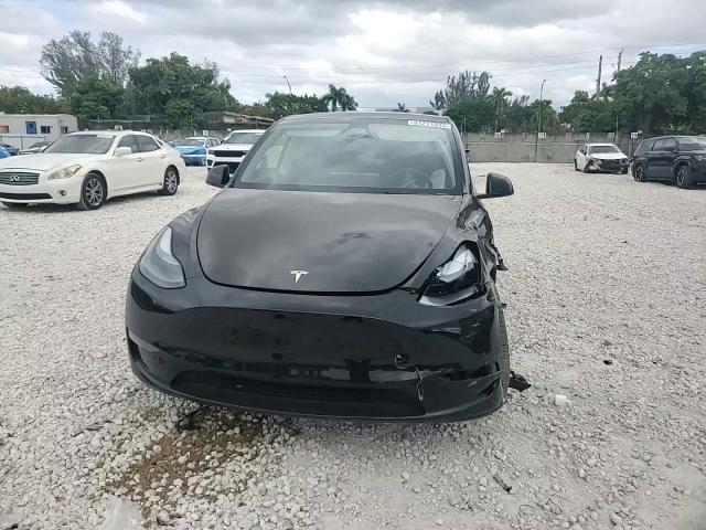 2023 Tesla Model Y VIN: 7SAYGDEE8PA167096 Lot: 91211235