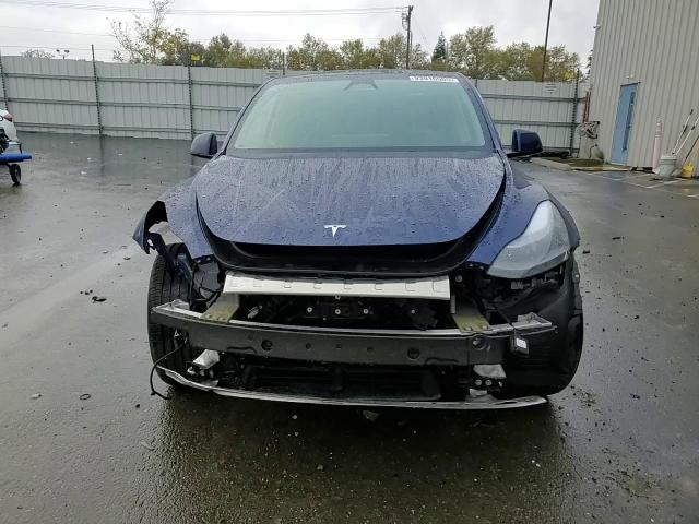 2025 Tesla Model Y VIN: 7SAYGDEE7SF290464 Lot: 93016905