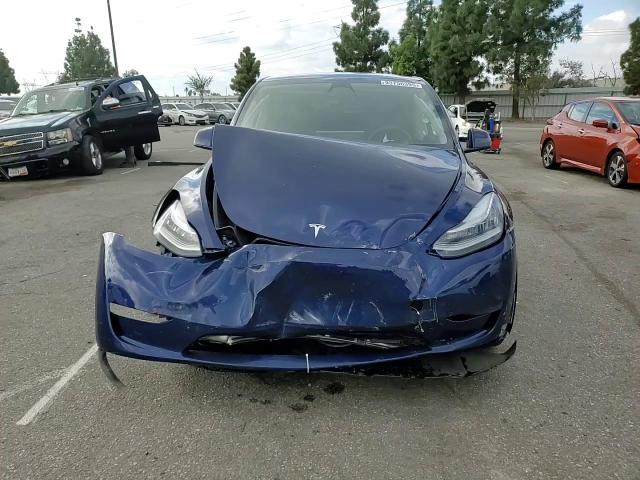 2023 Tesla Model Y VIN: 7SAYGDEE2PA112188 Lot: 93756395