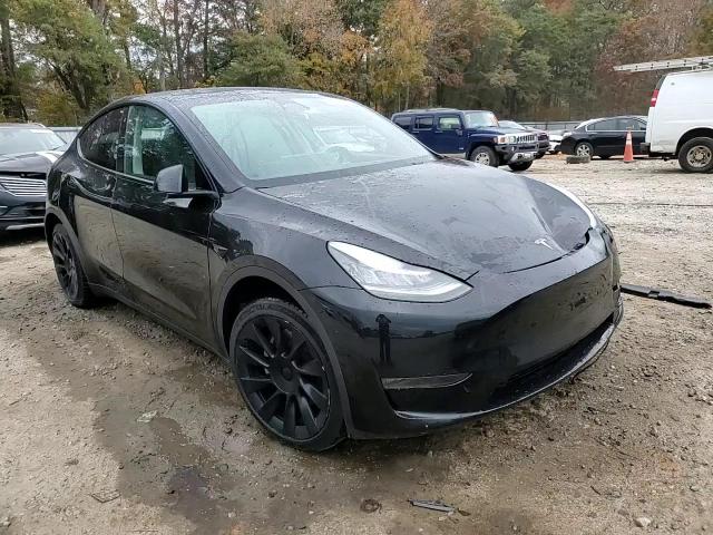 2023 Tesla Model Y VIN: 7SAYGDEE8PA026285 Lot: 91407395