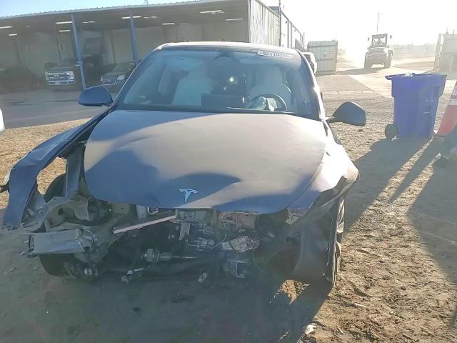 2023 Tesla Model Y VIN: 7SAYGAEEXPF868126 Lot: 92115305