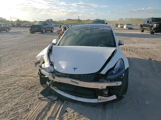 2021 Tesla Model 3 VIN: 5YJ3E1EB4MF027630 Lot: 94515615
