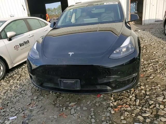 2023 Tesla Model Y VIN: 7SAYGDEE8PF760010 Lot: 91577905