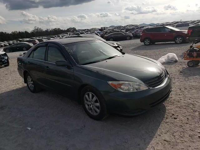 2002 Toyota Camry Le VIN: 4T1BF32K52U506468 Lot: 93301935