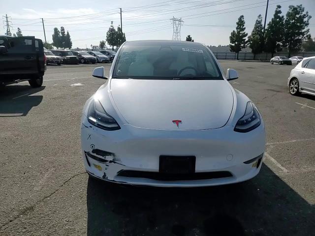 2022 Tesla Model Y VIN: 7SAYGDEEXNF411086 Lot: 91386085