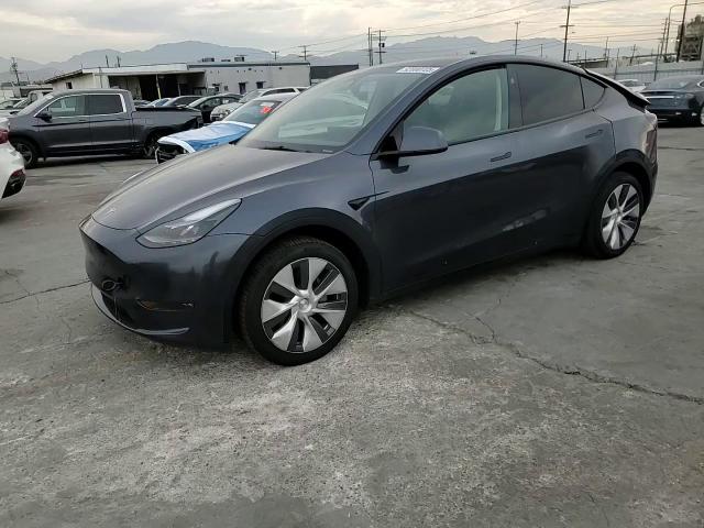 2023 Tesla Model Y VIN: 7SAYGDEE7PA209404 Lot: 92000725
