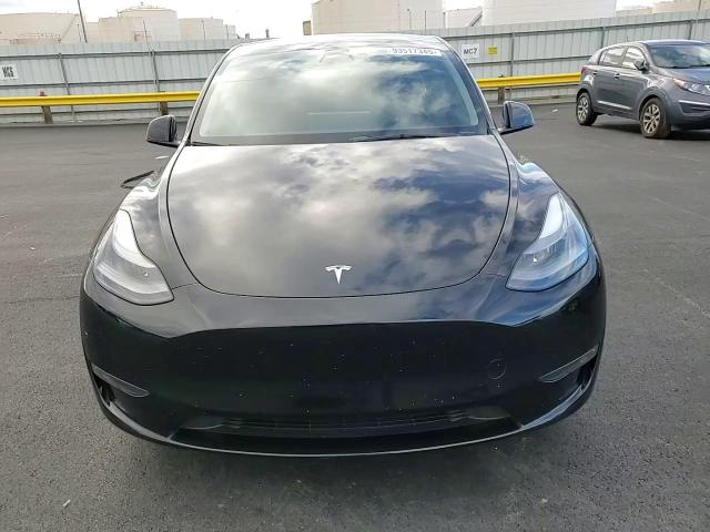 2023 Tesla Model Y VIN: 7SAYGDEE2PF760231 Lot: 93517345