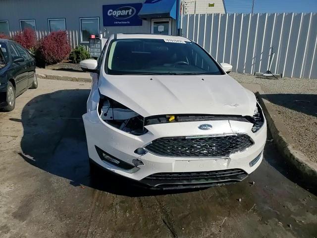 2015 Ford Focus Titanium VIN: 1FADP3J23FL383637 Lot: 91919455