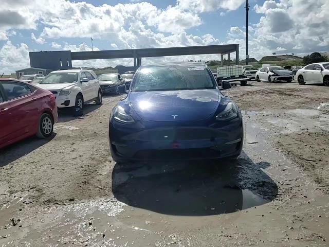 2023 Tesla Model Y VIN: 7SAYGAEE0PF666461 Lot: 94701725