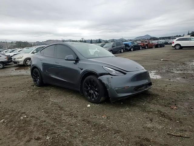 2023 Tesla Model Y VIN: 7SAYGDEE7PF747104 Lot: 84492254