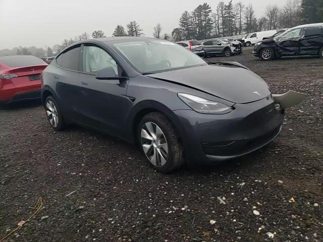 2023 Tesla Model Y VIN: 7SAYGDEE3PA203552 Lot: 84220664