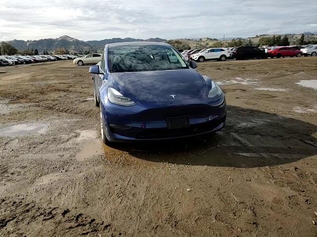 2023 Tesla Model Y VIN: 7SAYGDEE9PF896212 Lot: 85046114