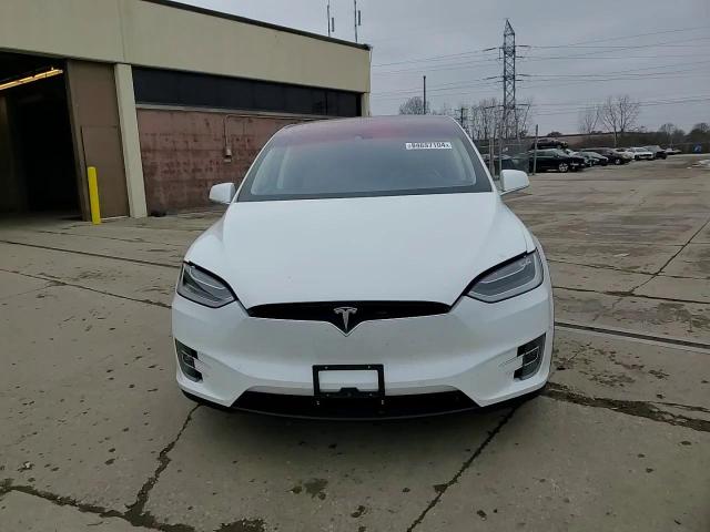 2016 Tesla Model X VIN: 5YJXCBE20GF012107 Lot: 84697104