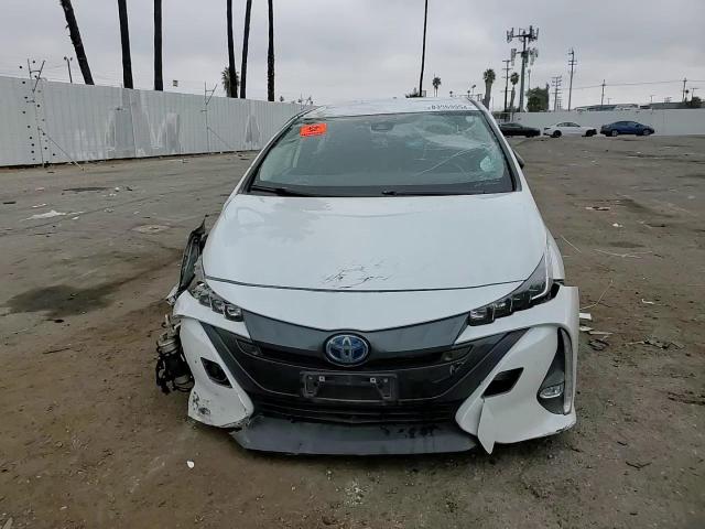 2021 Toyota Prius Prime Le VIN: JTDKAMFP7M3166831 Lot: 83969954