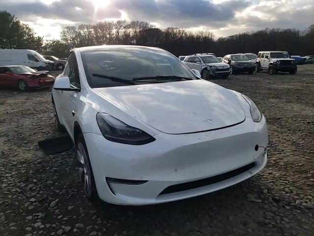 2023 Tesla Model Y VIN: 7SAYGAEE7PF749059 Lot: 82666824