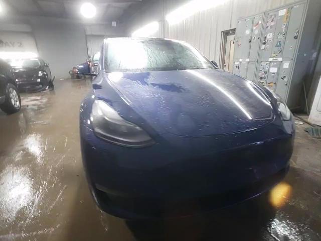 2023 Tesla Model Y VIN: 7SAYGDEE1PF706032 Lot: 84634514